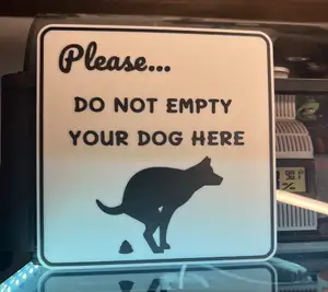 Please Do Not Empty Your Dog Here Sign