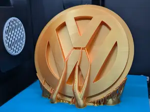 VW domed badge