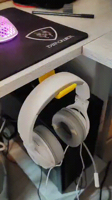 Sliding headphone holder