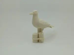 Moewe auf Holzpfahl – maritime Figur
