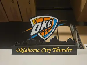 Oklahoma city thunder with skyline of Oklahoma NBA
