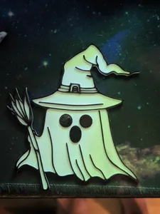 Ghost with witch had and broom 