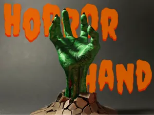 Terrifying horror hand breaking through the ground