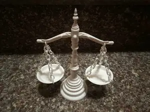 Accident Greek balance scale