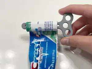 Toothpaste tube squeezer