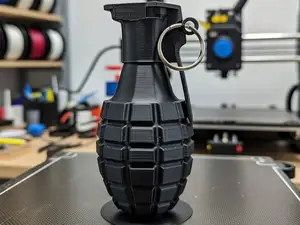 grenade a main porte clé