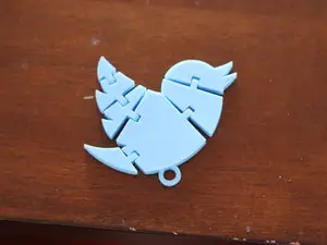 Articulated twitter keychain