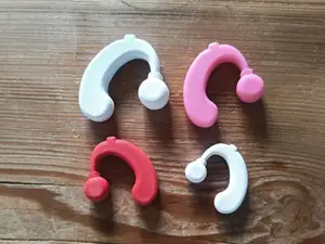Hearing aids for cuddly toys and dolls