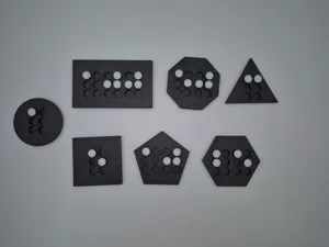 Braille game token for visually impaired people