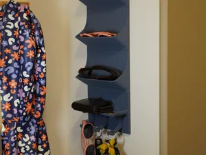Organiseur mural modulaire pour vestiaire