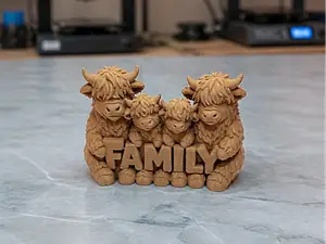 Highland Kuhfamilie mit Family Schrift