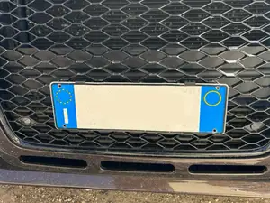Audi honeycomb grille license plate support