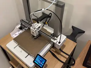 Anti wobble for printer desk