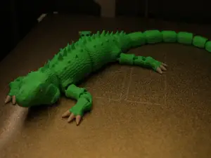 Articulated iguana lizard