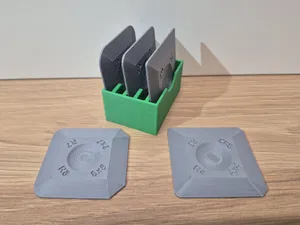 Stiff silicone and putty corner spreading tool