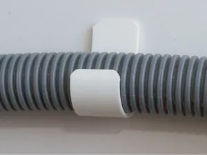 Wall-Mounted Washing Machine Hose Clip