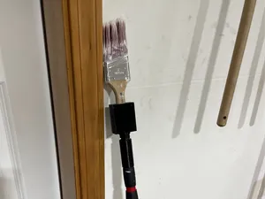 Paintbrush to paint roller extender adapter