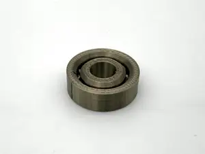 608 ball bearing (spins smoothly just off the bed)