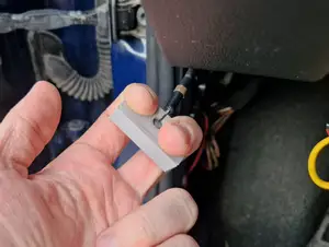 Emergency car hood release lever