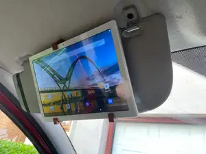 holder for a tablet on the sun visor in the car