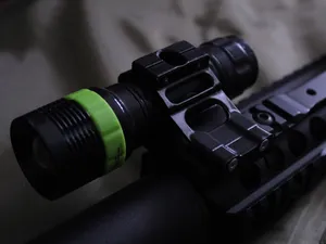 Picatinny rail flashlight mount