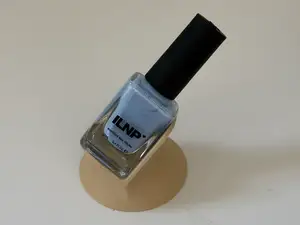 Nail polish bottle holder stand for square bottles