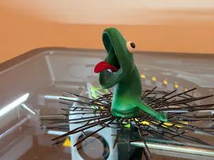 Unstoppable Lizard – Breaking Through Glass