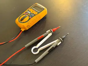 Multimeter probe tweezer one-handed pliers