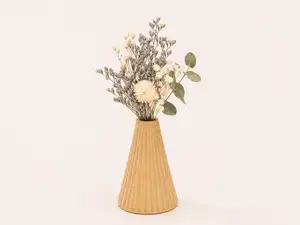 A mini vase suitable for a dollhouse.