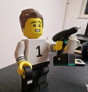 Worker brick man with drill and measuringtape