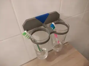Glass holder for toothbrush