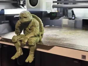 Sad Ninja Turtle Michelangelo on a Ledge Figurine