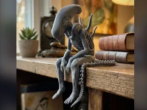 Sad Alien (Xenomorph) Figurine sitting on a ledge!