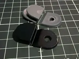 Screw-Mounted Flexible Panel Retaining Clip
