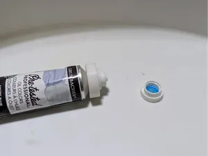 Grumbacher paint tube regulator cap