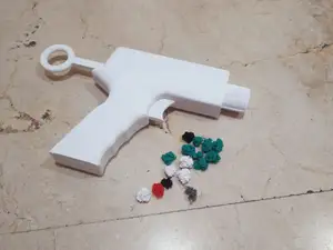 Pistola lanza purgas / pelotas