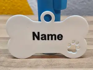 Hundemarke Knochen mit Pfote │ Namensschild