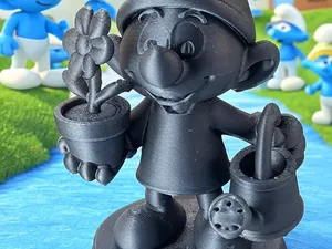 Schtroumpf jardinier avec arrosoir et fleur
