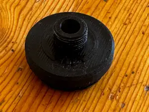 Cap with integrated male M12 CCW thread
