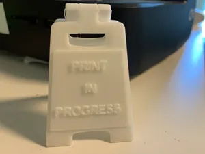 print in progress sign