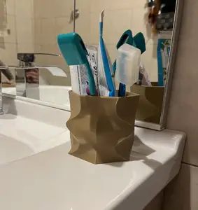Toothbrush and toothpaste holder