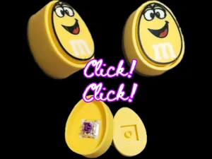 Yellow M&M Clicker – Goofy, Clueless, Clicky Fun