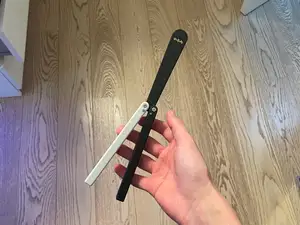 calibrated balisong v 3 with batman blade squiddy