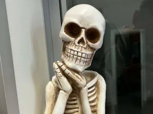 Meditating Skeleton Figurine