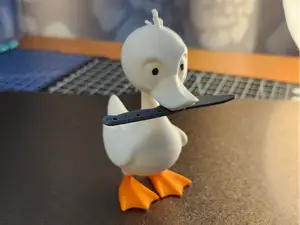 Goose with magnetic knife