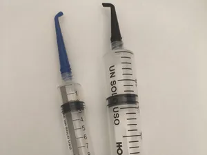 Syringe needle with a 45 and 90 degree bend.