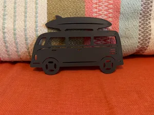 VW Van with Surfboard