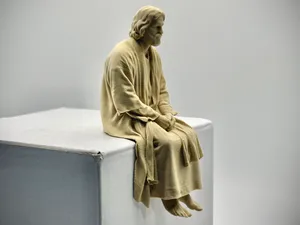Jesus Christ Figurine sitting on a ledge!