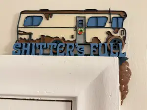 Cousin Eddie Camper “Shitter’s Full” - Wall Art