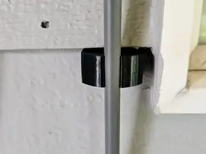 Holder for Coolaroo shade/awning crank lap siding